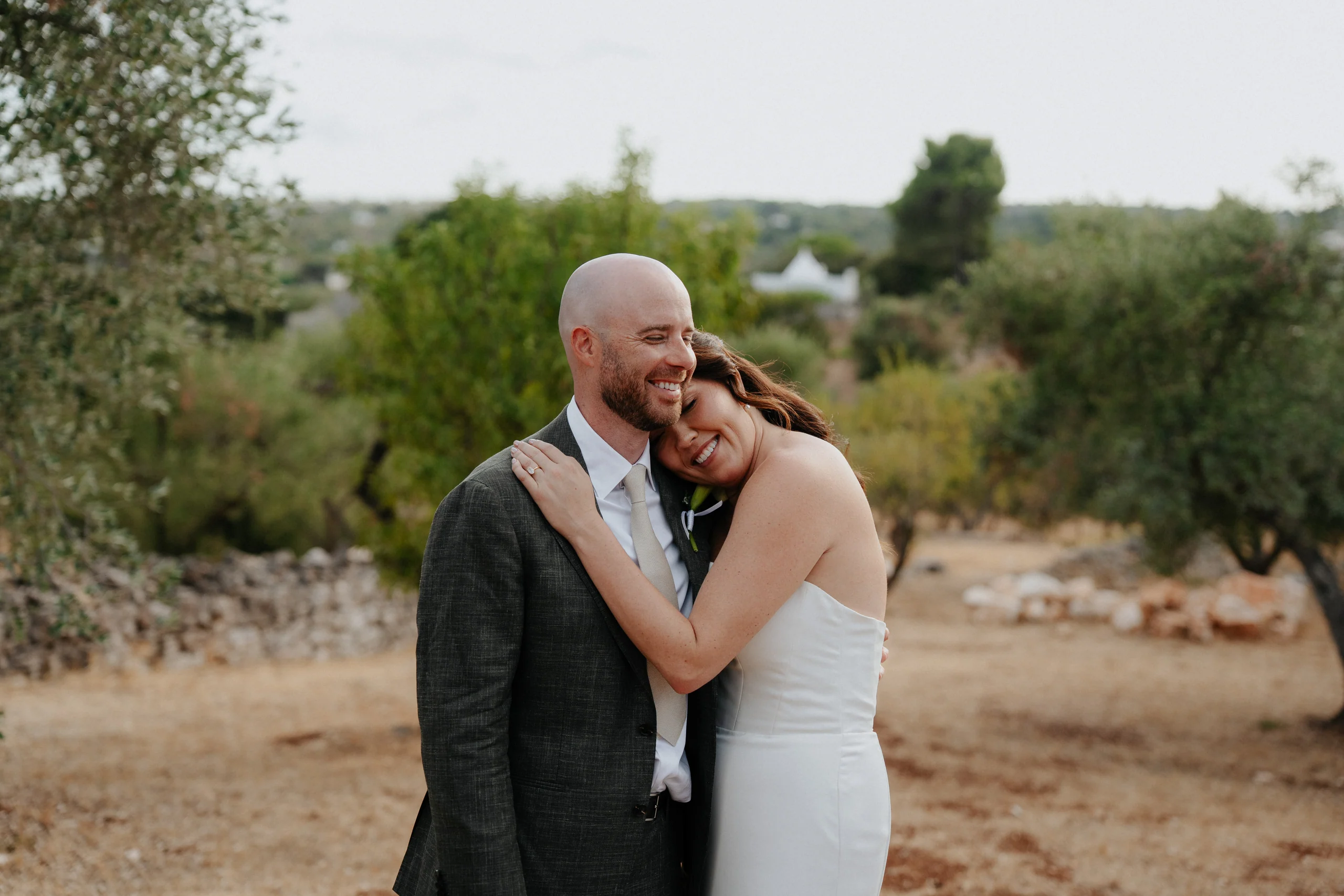 Emma and Connor embracing among the olive trees at Villa Rocca 1914